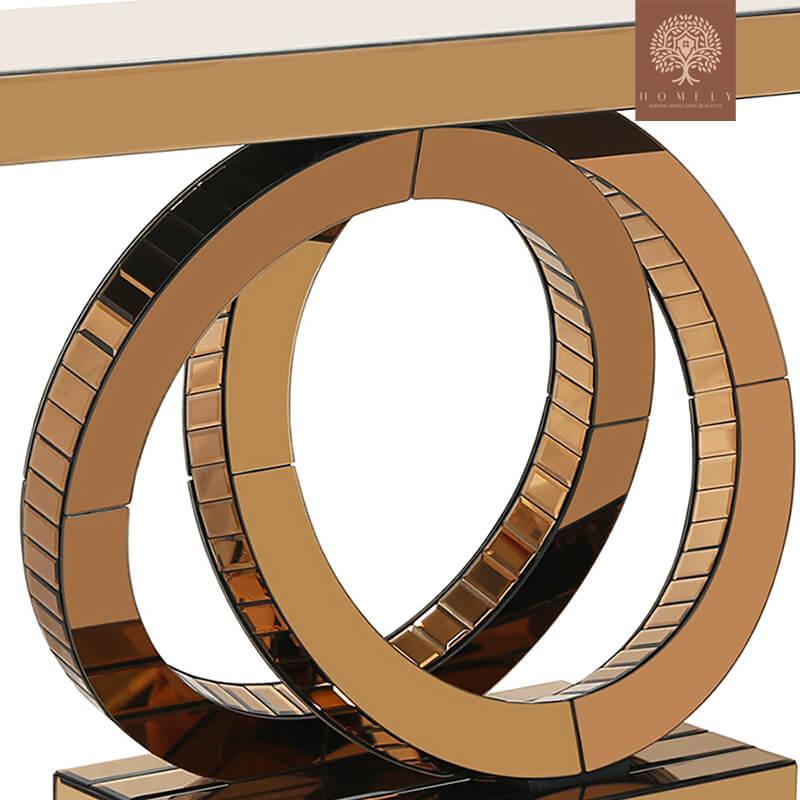 CASTIGLIA-CONSOLE MODERNE DORÉE AVEC BASE À ANNEAUX ENTRELACÉS-